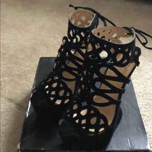 Heeless wedges! Too cute in black suede